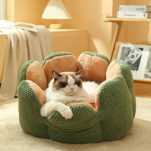 Cat relaxing in a Cactus Petal Pet Nest by littlepawgive, surrounded by soft green and beige plush petals, enjoying cozy comfort.