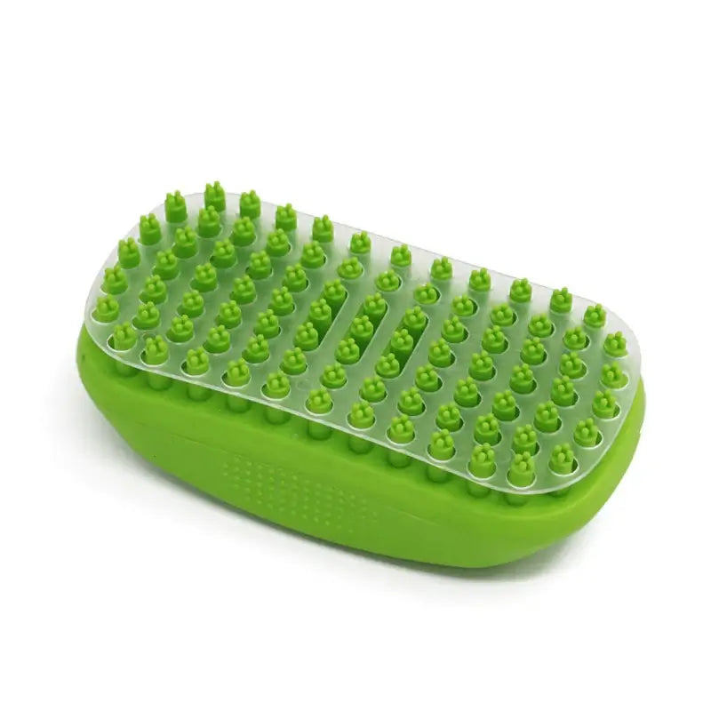 Comfort Pet Grooming Brush in green, featuring soft bristles for gentle pet massage and grooming during bath time.