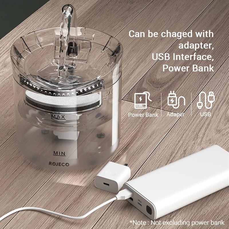 Pet water dispenser connected to a power bank USB and adapter for versatile charging options