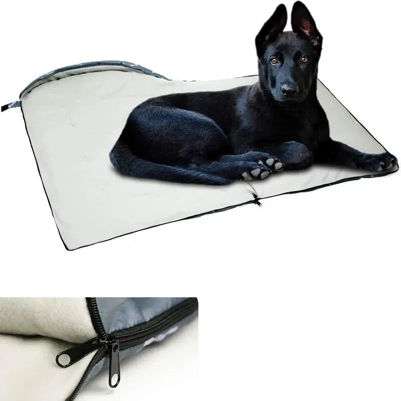 Black dog relaxing on a Comfort Waterproof Dog Sleeping Bag, showcasing its soft, cozy design for outdoor adventures.