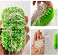 Load image into Gallery viewer, Comfort Pet Grooming Brush covered in pet hair, showcasing its effective grooming capabilities and ergonomic design.
