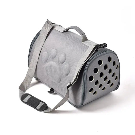 Comfort small dog carrier in gray with breathable design, ideal for pet travel and convenience.