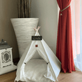 Load image into Gallery viewer, Pet Teepee Tent Indoor Puppy House & Cat Bed by Littlepawgive in a stylish room with red curtains and modern decor.
