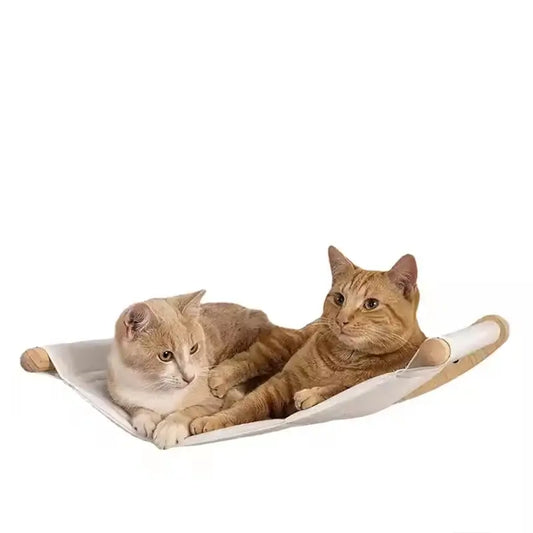 Two cats lounging together on a cozy wall-mounted cat hammock, showcasing comfort and relaxation.