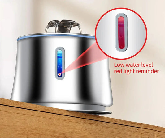 Stainless steel pet water fountain with low water level indicator and red light reminder for optimal hydration.