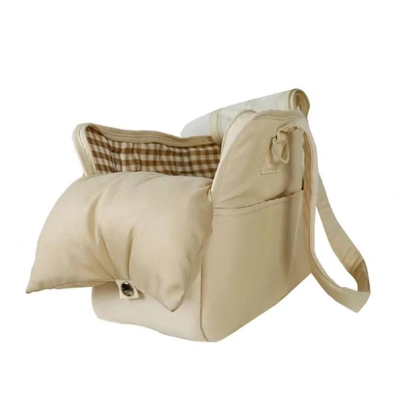 Comfortable beige pet carrier bag with adjustable shoulder strap and sturdy handle for ultimate pet safety by littlepawgive