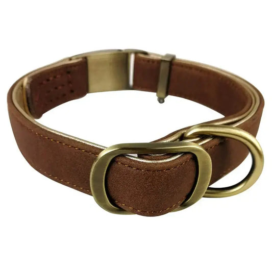 Luxury leather dog collar in brown with brass hardware, designed for comfort and durability.