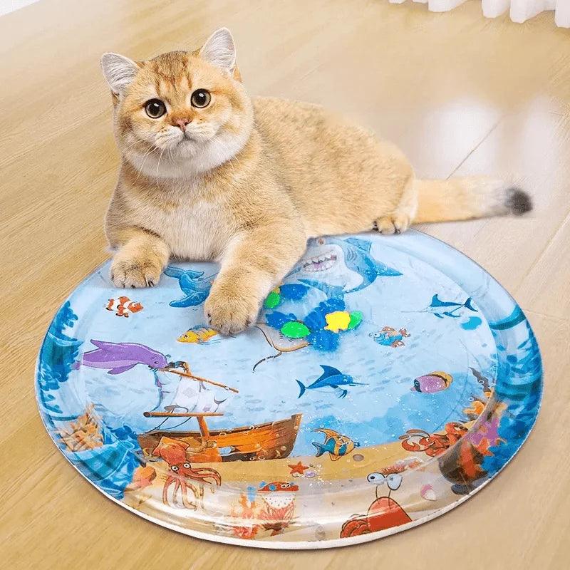 Cat lounging on colorful ocean-themed Summer Cooling Pet Water Bed by littlepawgive