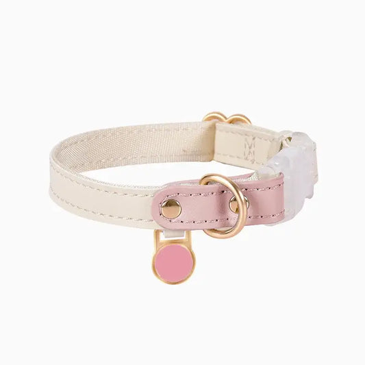 Anti-lost cat leather harness featuring customizable nameplate and elegant design in cream and pink tones.