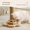 Load image into Gallery viewer, Cat engaging with a turntable scratching post featuring a catnip ball and playful design, promoting healthy scratching habits.
