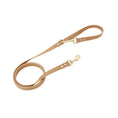 Load image into Gallery viewer, Anti-lost cat leather leash in tan with gold hardware, designed for comfort and style during outdoor cat adventures.
