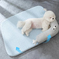 Load image into Gallery viewer, Small white dog resting comfortably on a Summer Bed Ice Mat with cooling gel technology ideal for pets in hot weather - littlepawgive
