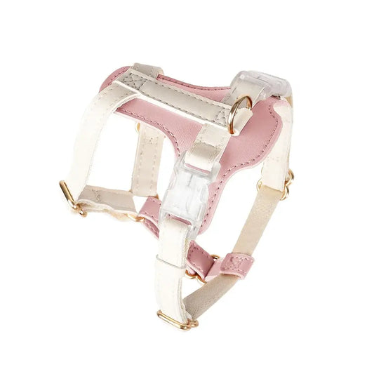 Anti-lost cat leather harness in pink and white with adjustable straps for secure outdoor adventures.