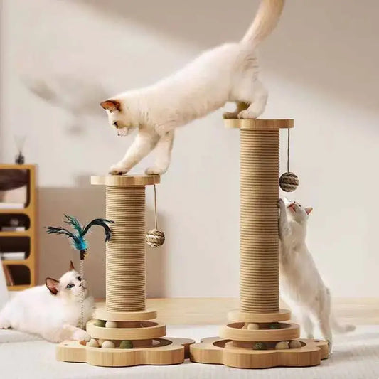 Two playful cats on a stylish cat climbing frame with sisal scratching posts and hanging toys, showcasing fun and active playtime.