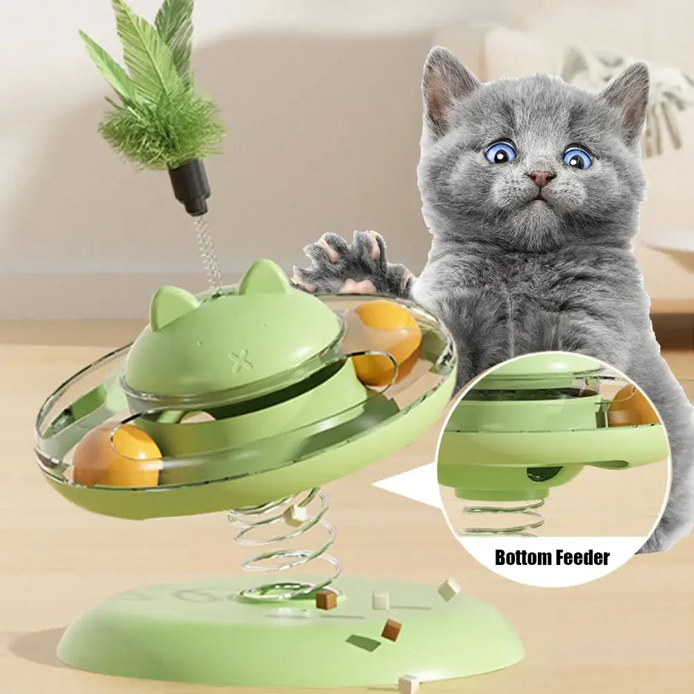 Interactive cat toy with spinning ball and treat dispenser, featuring a playful kitten and green design.