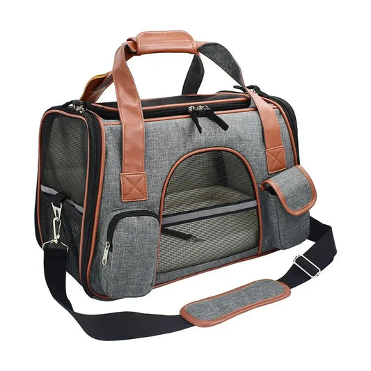 Stylish grey pet carrier with safety features, multiple pockets, and adjustable shoulder strap for comfortable travel.